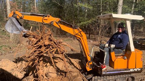 stump removal with mini excavator|stump removing machine.